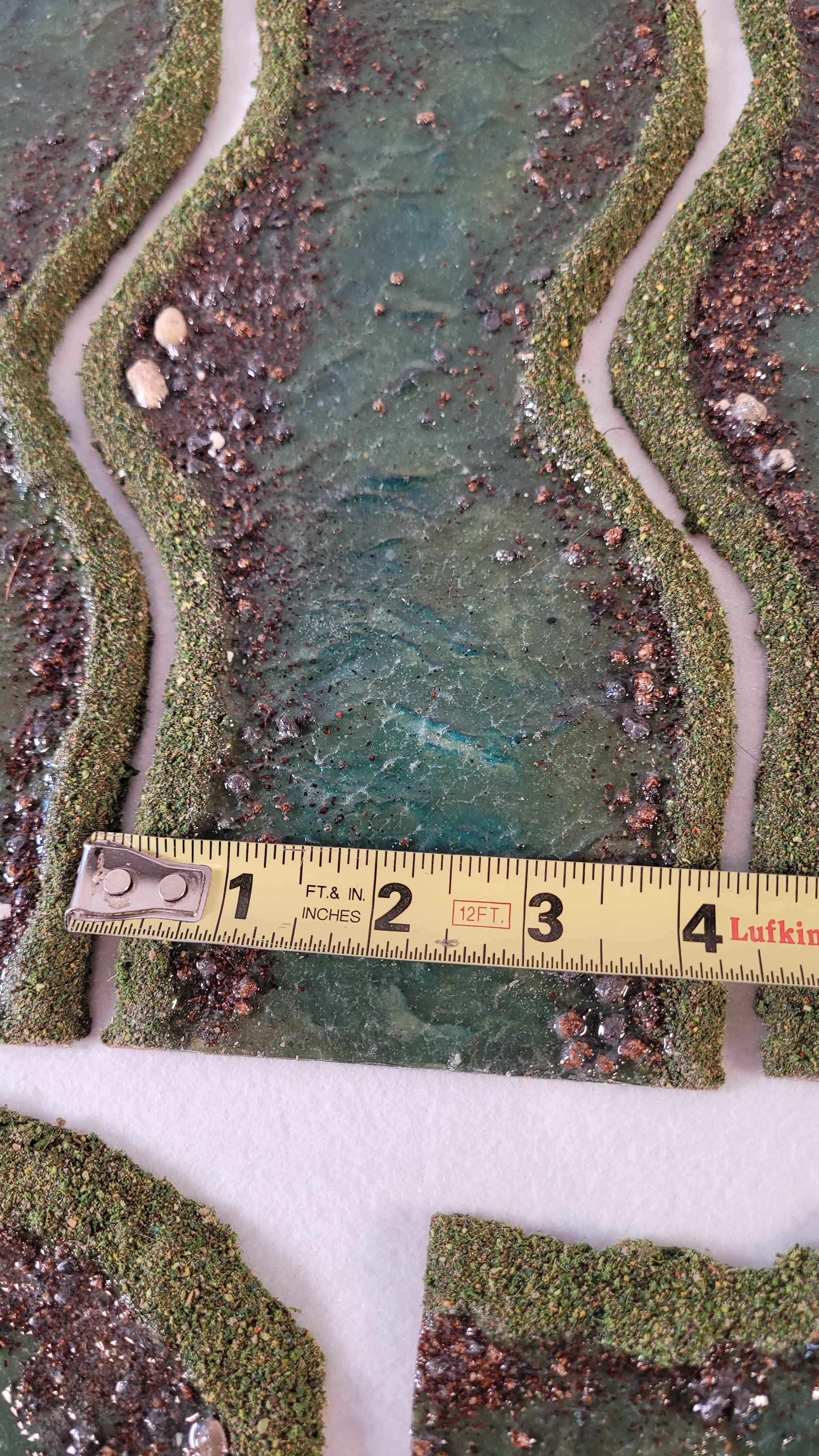 River terrain section showing 3 inch water channel width for miniature wargaming