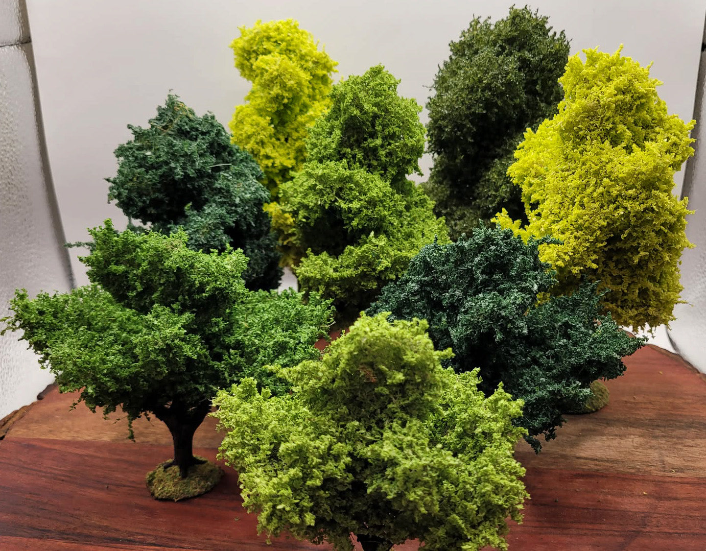 Handmade Wargaming Trees – Set of 8 | Weighted Bases | 28mm / 15mm Tabletop Terrain