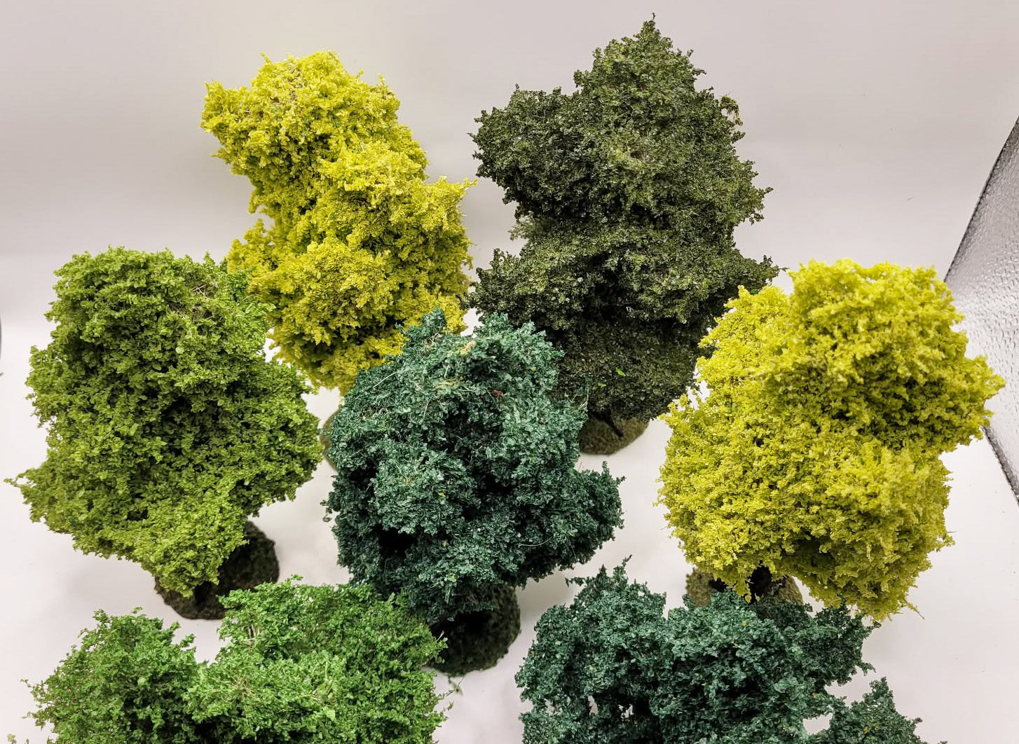 Handmade Wargaming Trees – Set of 8 | Weighted Bases | 28mm / 15mm Tabletop Terrain