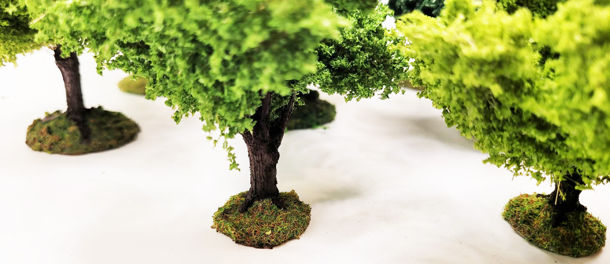 Handmade Wargaming Trees – Set of 8 | Weighted Bases | 28mm / 15mm Tabletop Terrain